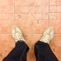 Sneaker shoes on tiled floor