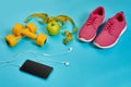 Sneakers, centimeter, green apple, weight loss, running, healthy eating, healthy lifestyle concept Royalty Free Stock Photo