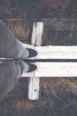 Sneakers on duckboards.