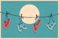 Sneakers hanging in retro style. Royalty Free Stock Photo