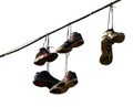 Sneakers Hanging on a Telephone Line Royalty Free Stock Photo