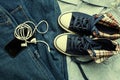 Sneakers, jeans and gadgets