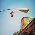 Sneakers on lamp post