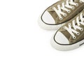 Sneakers in Olive green on a white background. Youth shoes