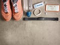 Sneakers, raw protein bar, smartphone with heart rate app