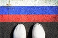 Sneakers and the Russia flag. View from above