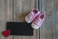 sneakers shoes on a rustic wooden background with free space Royalty Free Stock Photo