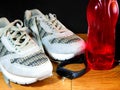 Sneakers, water and smart watch after exercise