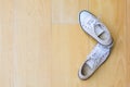 Sneakers white top view sports shoes close-up on a wooden background top view Royalty Free Stock Photo