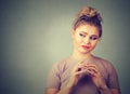 Sneaky, sly, scheming young woman plotting something. Negative human emotions, facial expressions Royalty Free Stock Photo