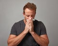 Sneezing man with cold Royalty Free Stock Photo