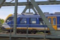 SNG sprinter local commuter train along the rail bridge at Kethel in schiedam Royalty Free Stock Photo