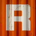 Sngle letter R on an orange corrugatedl background Royalty Free Stock Photo