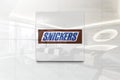 Snickers on glossy office wall realistic texture