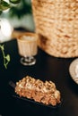 Snickers cake with nuts on a beautiful decorated table