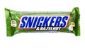 Snickers chocolate bar of sweets with hazelnuts white background. Snickers is a brand name chocolate bar made by the American Royalty Free Stock Photo