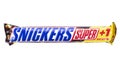 Snickers Super chocolate bar isolated on white background. Snickers is a brand name chocolate bar made by the American company