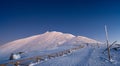 Sniezka mountain at dusk during winter in Giant mountains Royalty Free Stock Photo