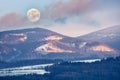 Snieznik Massif, moonrise over the mountains in the Sudetes