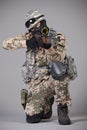 Sniper with rifle aiming Royalty Free Stock Photo