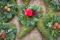 Snitch and wreaths from flowers, All Saints Day concept. Royalty Free Stock Photo