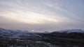 Snohetta mountain range at sunset in Dovrefjell National Oark in Norway Royalty Free Stock Photo