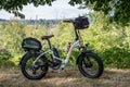Folding Electric Bicycle Parked Along the Centenal Rail Trail