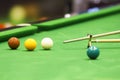 Snooker ball and rest stick Royalty Free Stock Photo