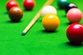 Snooker balls and cue on the table Royalty Free Stock Photo