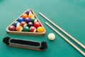 Snooker billards pool balls, cue, brush, chalk on green table Royalty Free Stock Photo