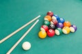 Snooker billards pool balls and cue stick on green table