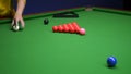 Snooker. close-up . male hands with cue playing billiards