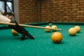 Snooker. close-up . male hands with cue playing billiards