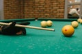 Snooker. close-up . male hands with cue playing billiards