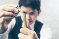 Snooker player standing waiting hold his cue Royalty Free Stock Photo