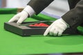 Snooker referee set up ball for new game Royalty Free Stock Photo
