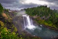 Snoqualmie Falls with lush greenery and mist in Washington State, USA Royalty Free Stock Photo