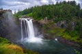 Snoqualmie Falls with lush greenery and mist in Washington State, USA Royalty Free Stock Photo