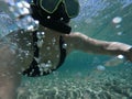 Snorkeling in blue water Royalty Free Stock Photo
