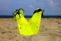 Snorkeling mask and fins on the sandy beach Royalty Free Stock Photo