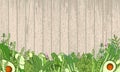 Green vegetables and verdure background - wooden texture