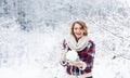 Snow add unique charm. Winter outfit. Snow makes everything outdoors look amazing. Woman warm clothes snowy forest