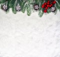 Snow background with fir branches and pine cones. Christmas decoration Royalty Free Stock Photo