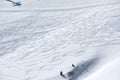 Snow background with ski and snowboard tracks