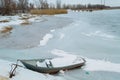 snow banks of forest river at winter sunset Royalty Free Stock Photo