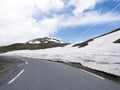 Snow on banks of road to col de la bonette in the french alps Royalty Free Stock Photo