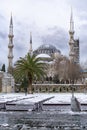 The Blue mosque (Sultanahmet mosque) in winter day with snow in Istanbul, Turkey. Snow storm in Turkey. Royalty Free Stock Photo