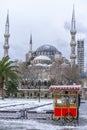 The Blue mosque (Sultanahmet mosque) in winter day with snow in Istanbul, Turkey. Snow storm in Turkey. Royalty Free Stock Photo