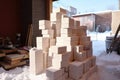 snow blocks stacked, ready for sculpting