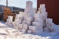 snow blocks stacked for sculpture base